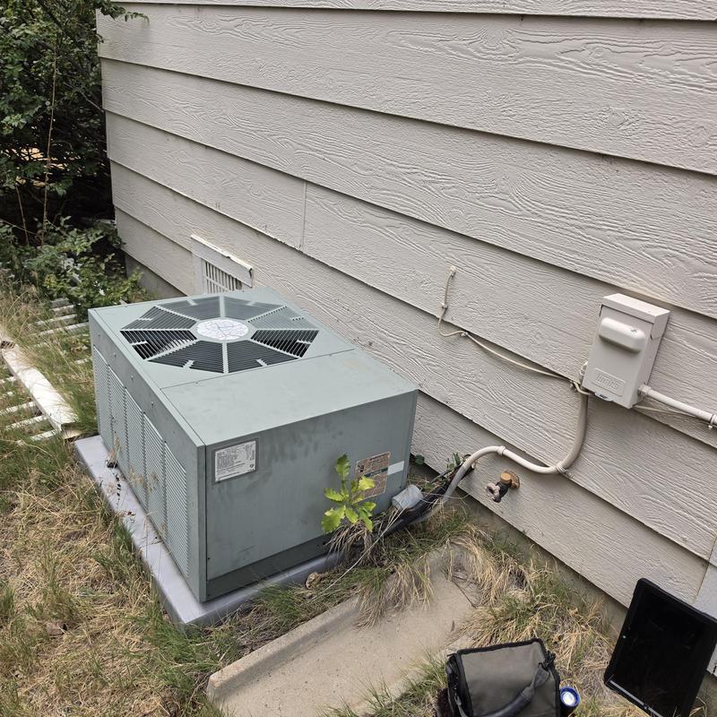Rheem air conditioner condenser fan unit outdoors Rheem air conditioner condenser fan unit outdoors
