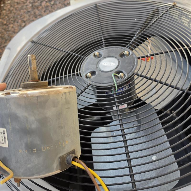 Condenser fan motor removed from Carrier AC unit Condenser fan motor removed from Carrier AC unit