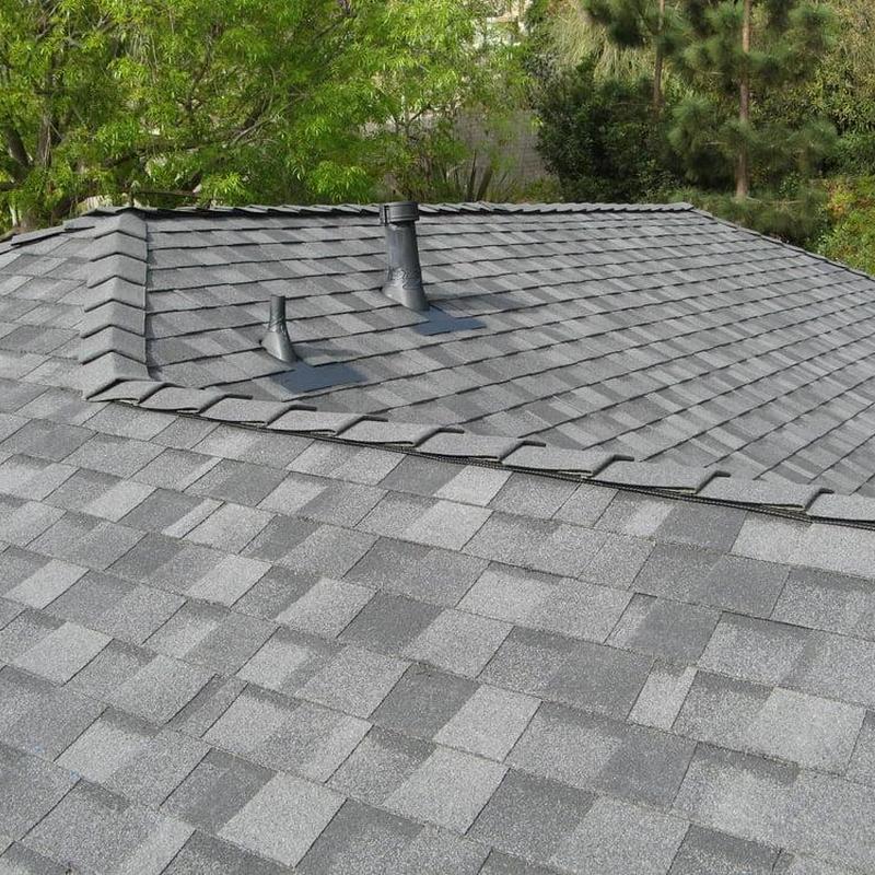 Asphalt shingle roof with vent pipe installations Asphalt shingle roof with vent pipe installations