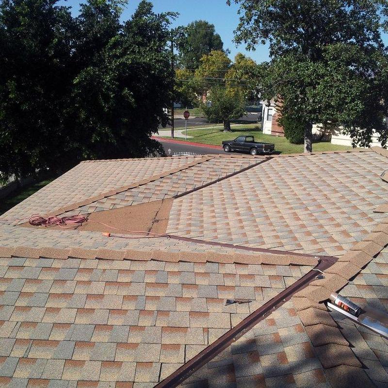Shingle roof section with inspection tools and sealing tube Shingle roof section with inspection tools and sealing tube