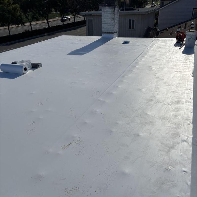 Flat roof membrane installation with ventilation pipes Flat roof membrane installation with ventilation pipes