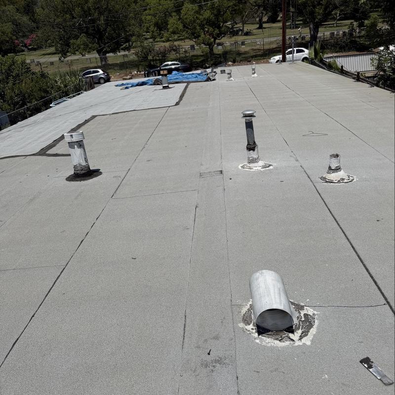 Flat roof membrane with vent pipe flashings inspection Flat roof membrane with vent pipe flashings inspection