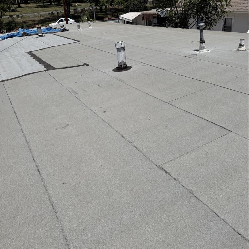 Flat roof with ventilation pipes and seams Flat roof with ventilation pipes and seams