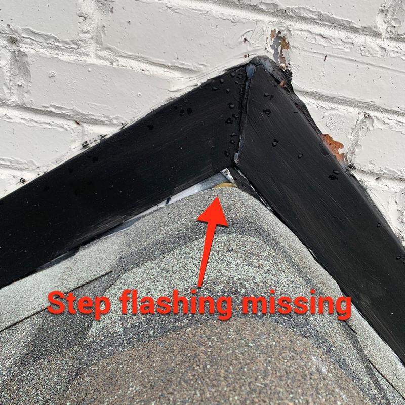 Step flashing missing on shingle roof corner