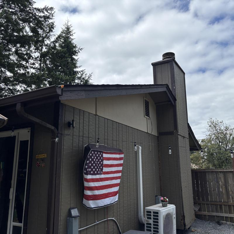 Roof edge and siding panel on residential home exterior Roof edge and siding panel on residential home exterior