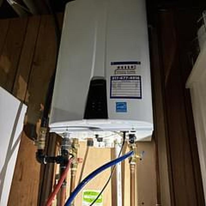 Tankless water heater with flush setup and piping