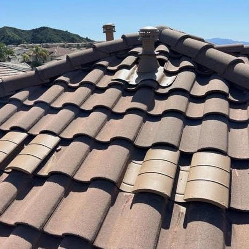 Tile roof ridge vents with chimney pipes in Garden Grove Tile roof ridge vents with chimney pipes in Garden Grove