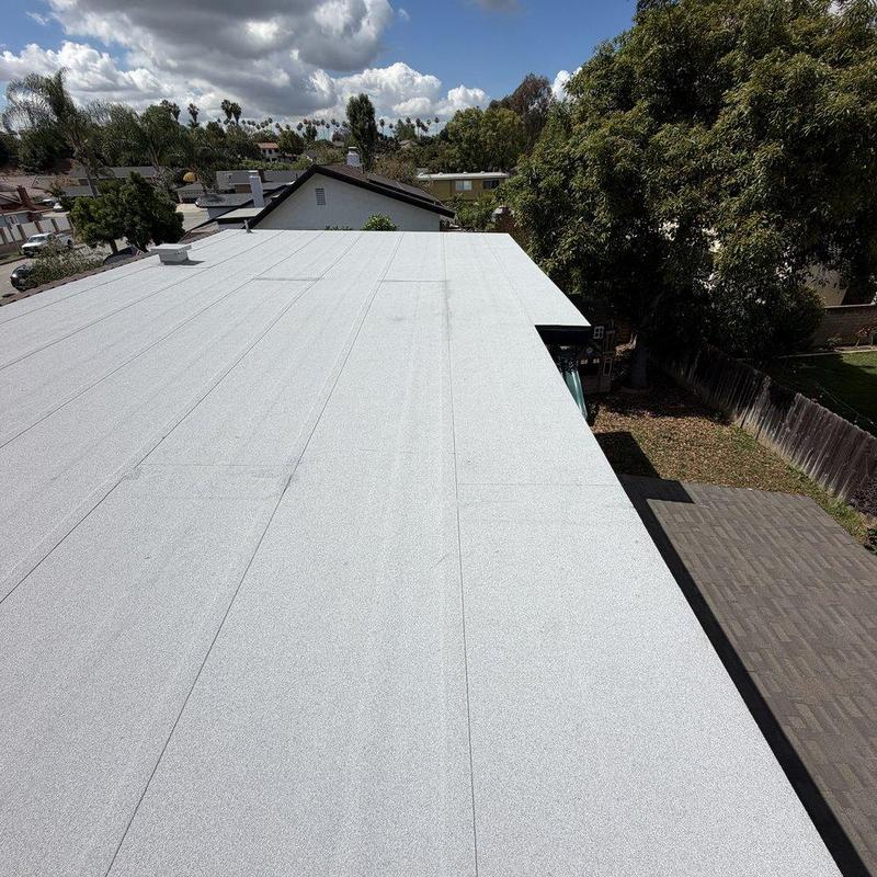 Flat roof membrane installation on residential building Flat roof membrane installation on residential building