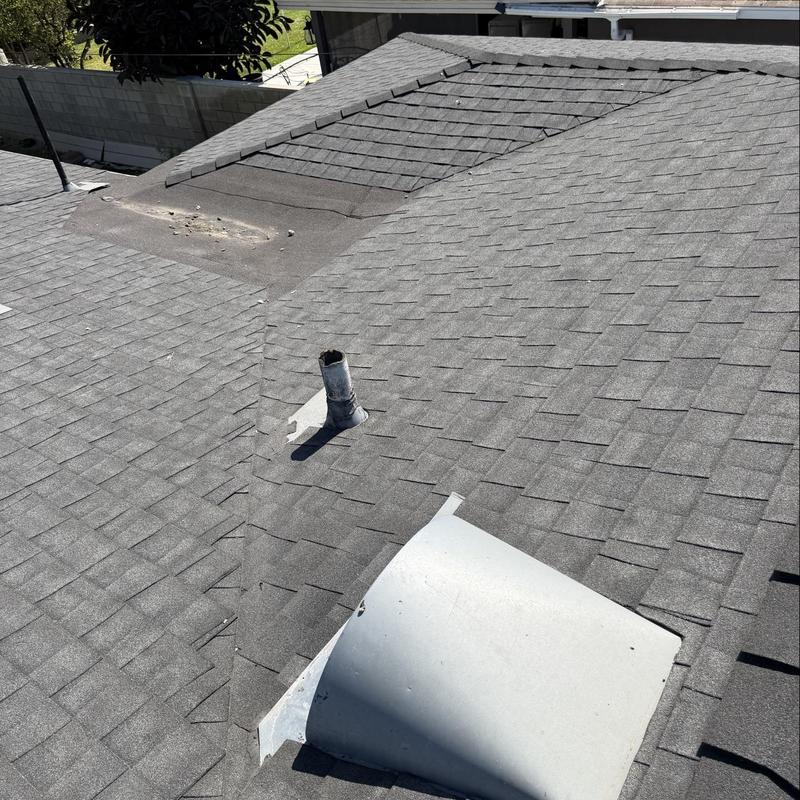 Shingle roof with vent pipe and patch inspection Shingle roof with vent pipe and patch inspection