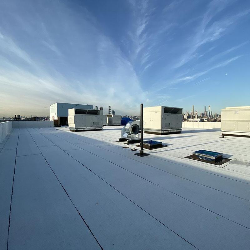 Commercial flat roofing with HVAC units and vents Commercial flat roofing with HVAC units and vents