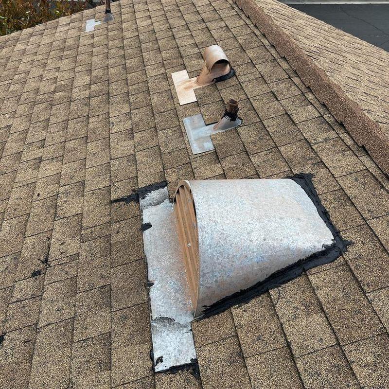 Shingle roof vent with sealed flashing on asphalt shingles Shingle roof vent with sealed flashing on asphalt shingles