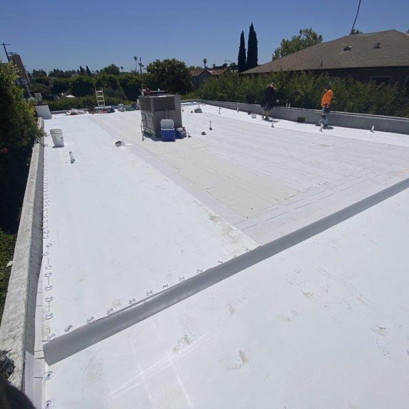 Flat roof membrane installation with HVAC unit Flat roof membrane installation with HVAC unit