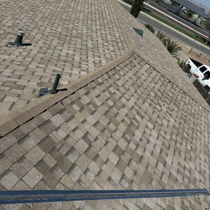 Shingle roof with vent pipes and ridge cap in Irvine Shingle roof with vent pipes and ridge cap in Irvine