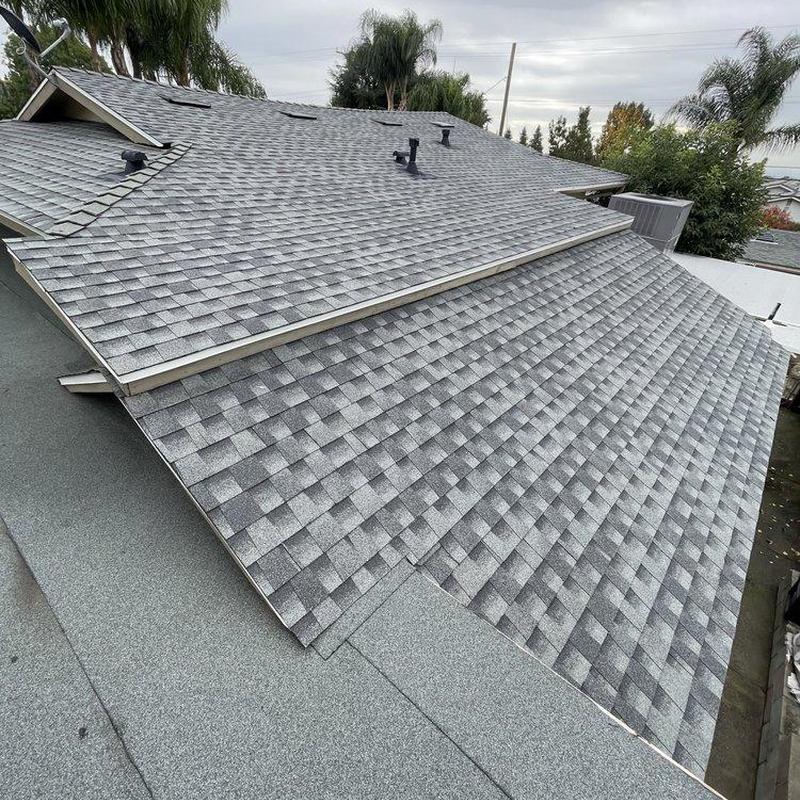 Shingle roof with vent pipes and gutters, La Habra CA Shingle roof with vent pipes and gutters, La Habra CA