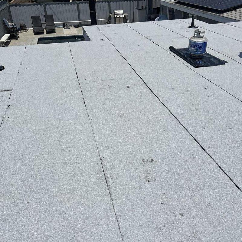 Flat roof surface with inspection equipment on top Flat roof surface with inspection equipment on top