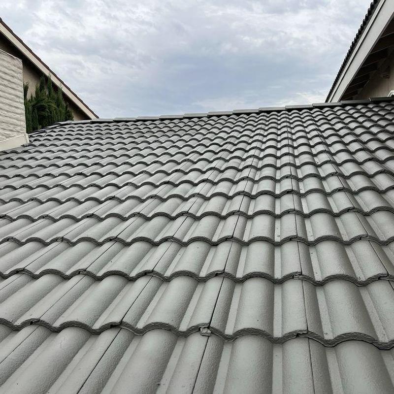 Clay tile roof with new gray tiles installation Clay tile roof with new gray tiles installation