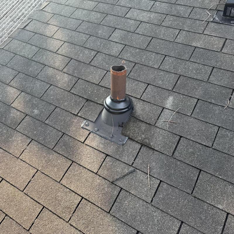Pipe boot and roof flashing installation on shingle roof
