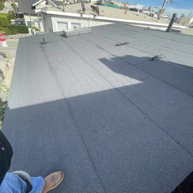 Flat roof surface with inspection in progress Flat roof surface with inspection in progress