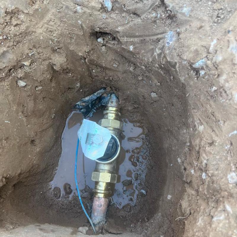 Water pressure regulator valve installation in excavation hole Water pressure regulator valve installation in excavation hole