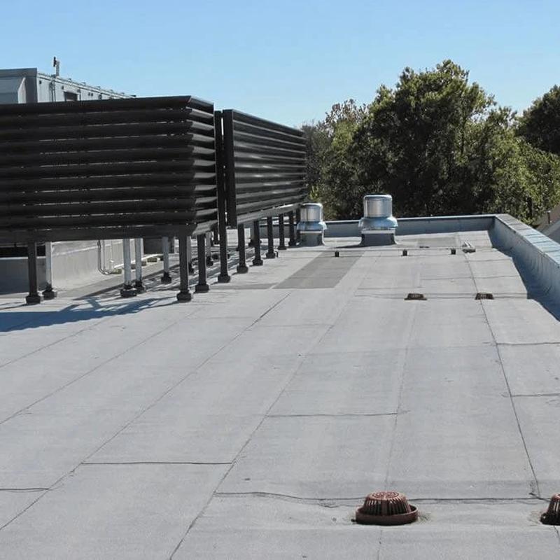 Flat commercial roofing system with ventilation units Flat commercial roofing system with ventilation units