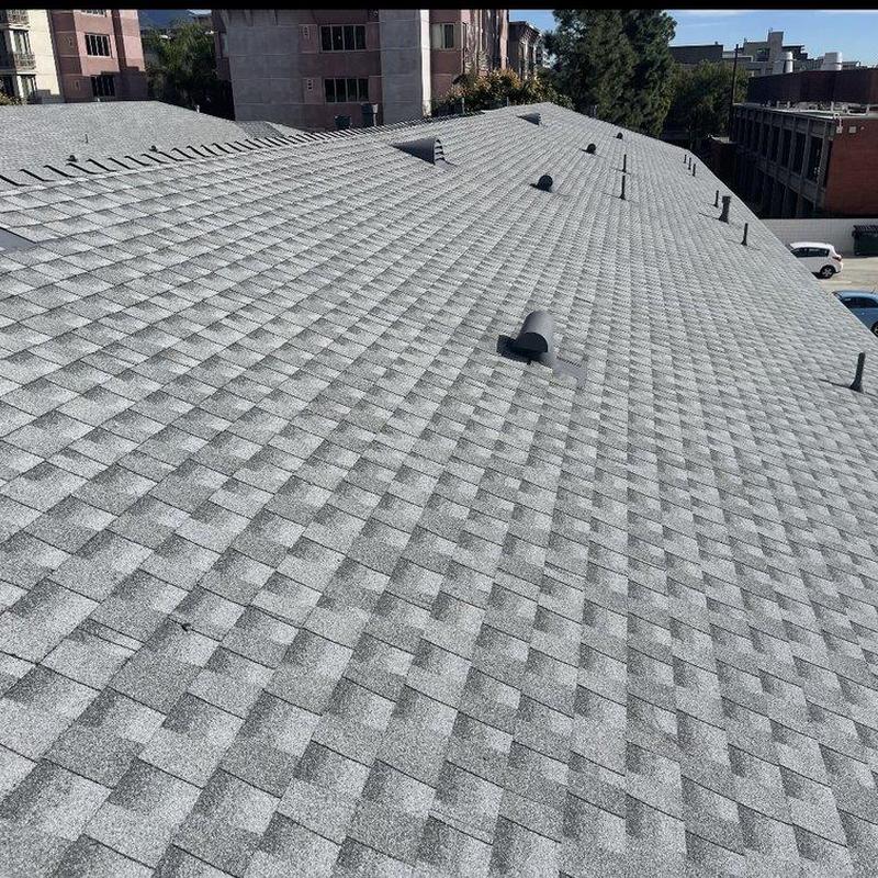 Asphalt shingle roof with ventilation pipes installed Asphalt shingle roof with ventilation pipes installed