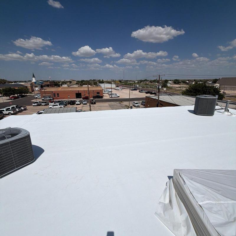 TPO retrofit roofing system over metal roof