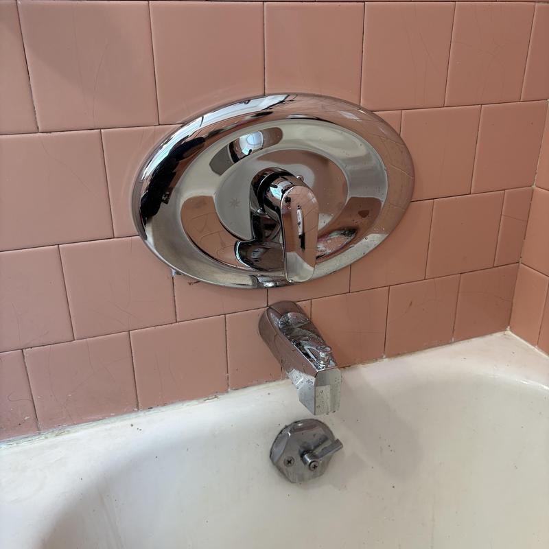Moen Poseitemp shower valve with tub spout and stopper