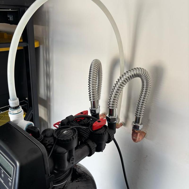 Green Titan 1,000 water softener installation with salt added Green Titan 1,000 water softener installation with salt added