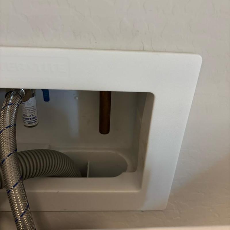 Washer drain box with cut drain and water line installation Washer drain box with cut drain and water line installation