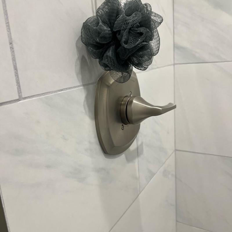 Delta shower faucet handle on tiled wall Delta shower faucet handle on tiled wall