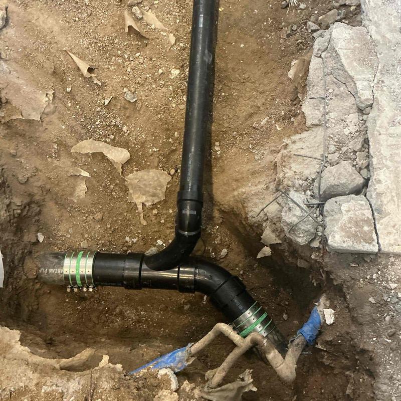 2-inch ABS drain piping installation in dirt trench 2-inch ABS drain piping installation in dirt trench