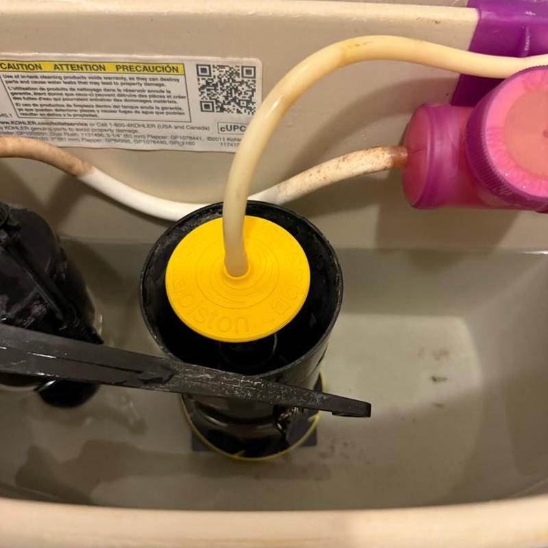 Toilet flush valve with yellow fill hose repair Toilet flush valve with yellow fill hose repair