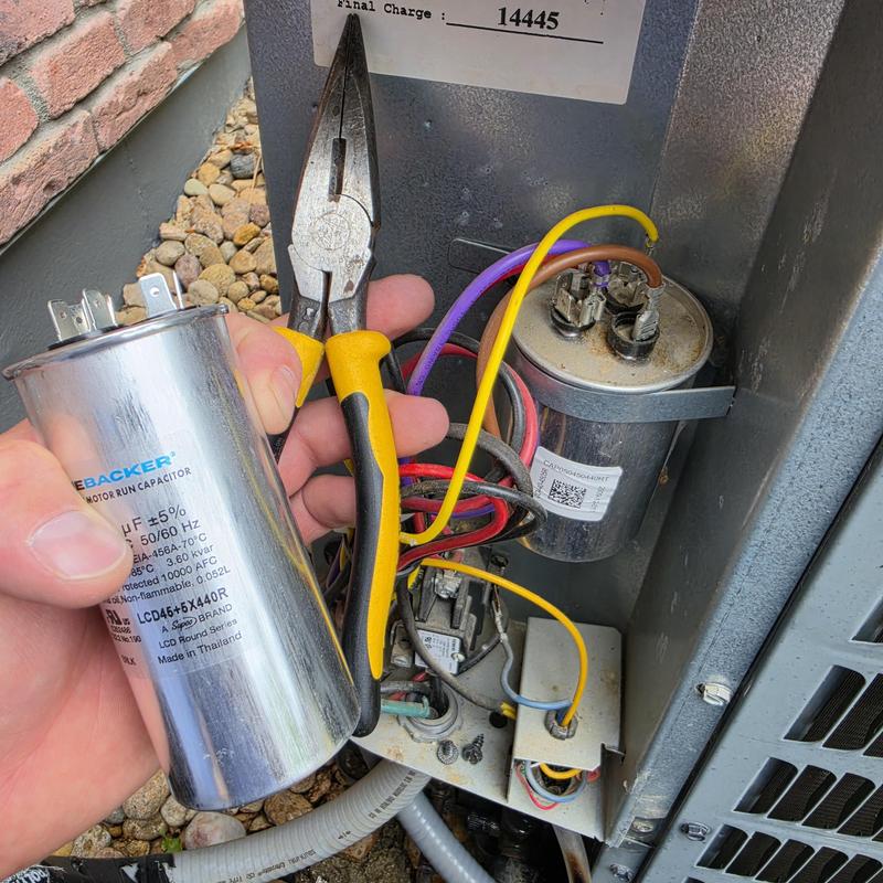 Goodman air conditioner capacitor replacement with pliers Goodman air conditioner capacitor replacement with pliers