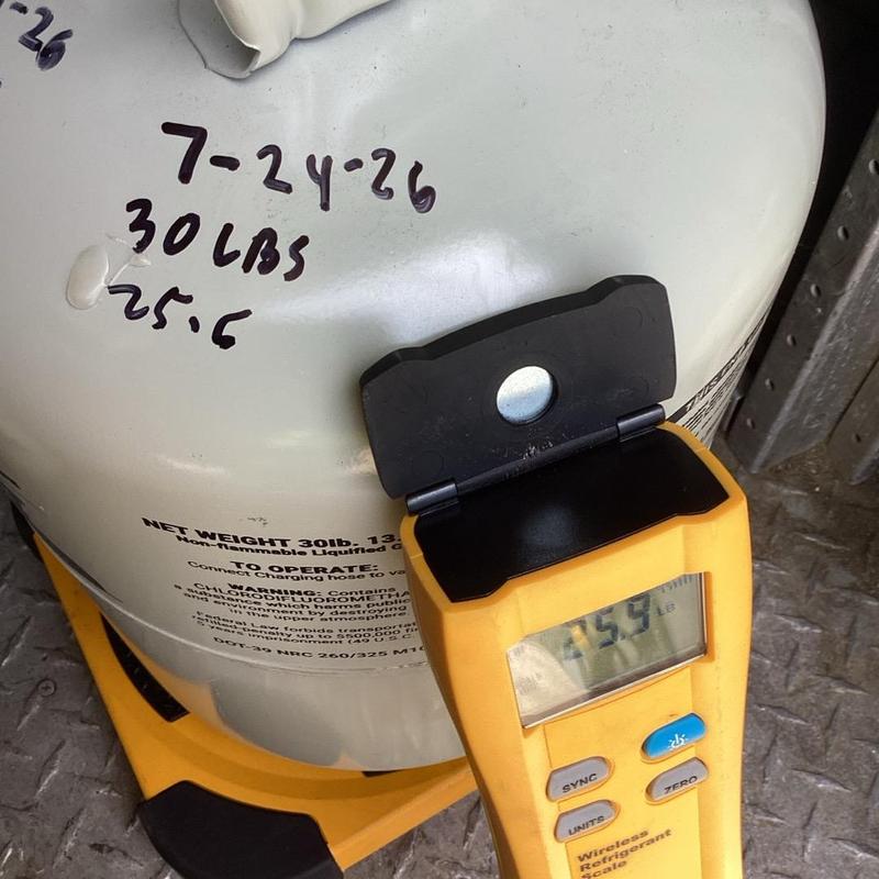 R22 refrigerant tank weight reading on scale