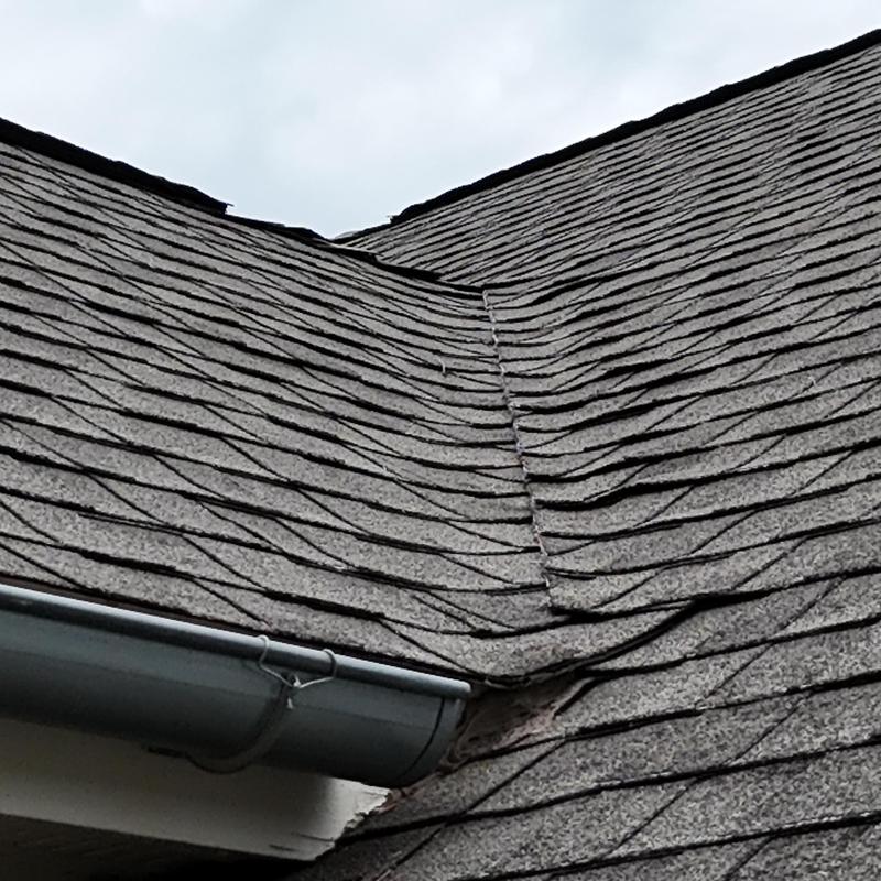 Asphalt shingle roof valley with gutter in Blackhawk CO