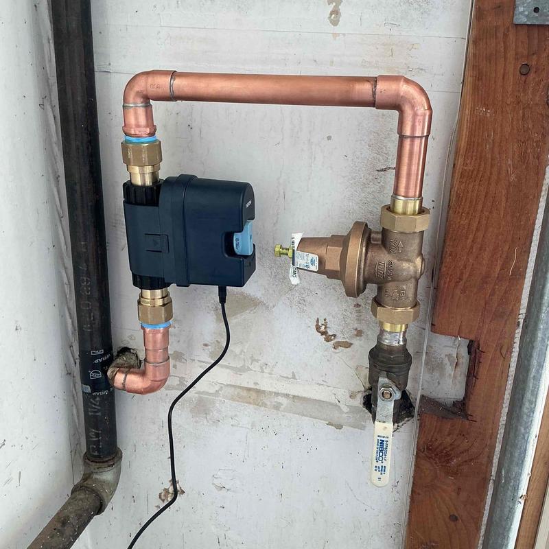 Moen Flo device and pressure regulator on water riser Moen Flo device and pressure regulator on water riser