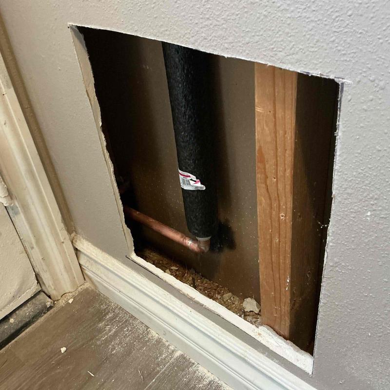 PEX water line installation inside wall cavity PEX water line installation inside wall cavity