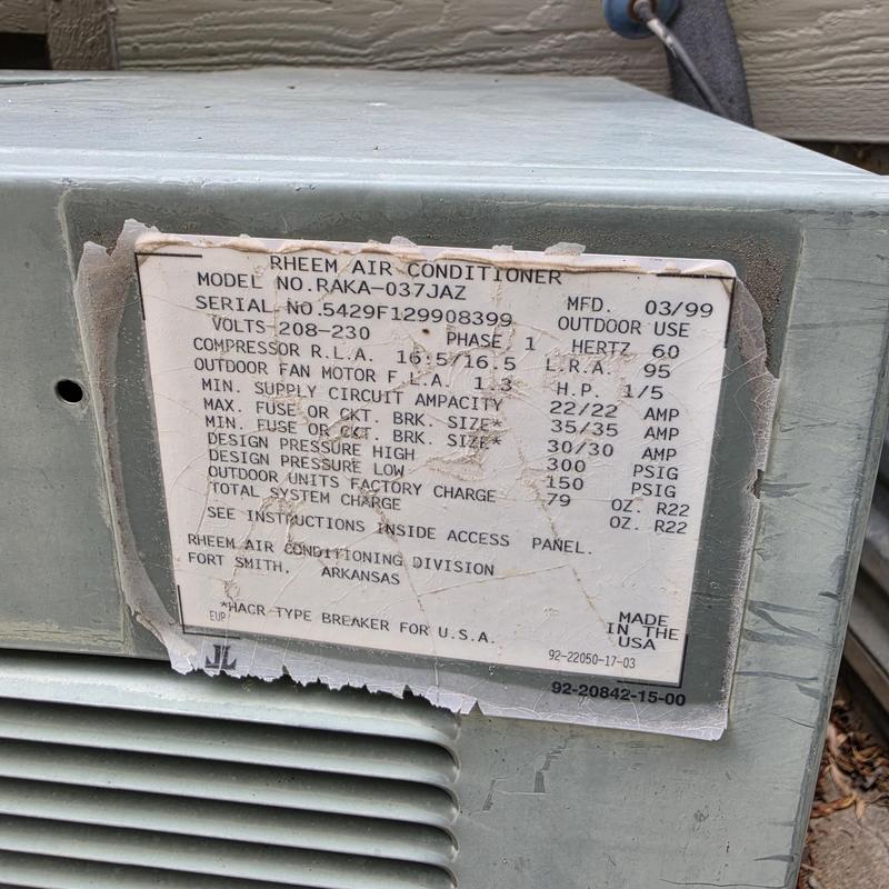 Rheem air conditioner model RAKA-037JAZ label close-up Rheem air conditioner model RAKA-037JAZ label close-up
