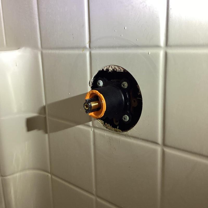 Shower cartridge replacement in tiled shower wall Shower cartridge replacement in tiled shower wall