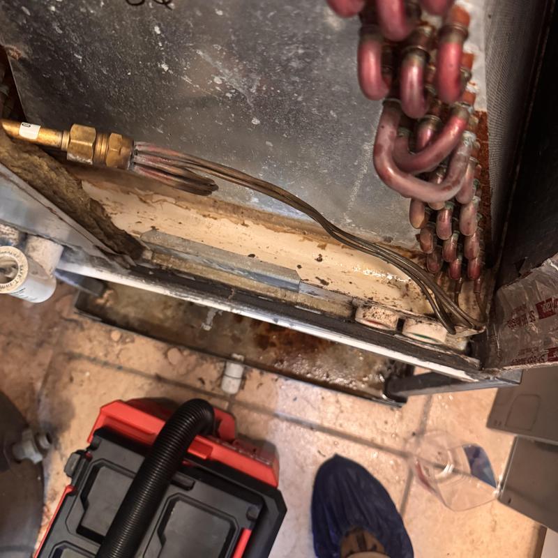 Heat pump evaporator coil copper tubing and vacuum pump