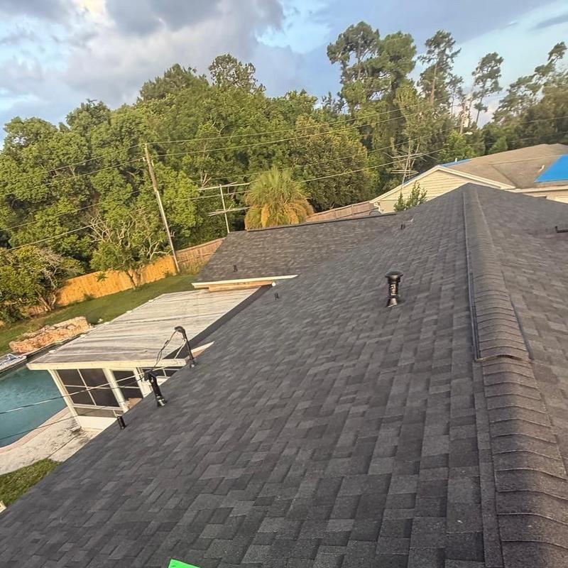 Architectural asphalt shingle roof in Onyx Black color Architectural asphalt shingle roof in Onyx Black color