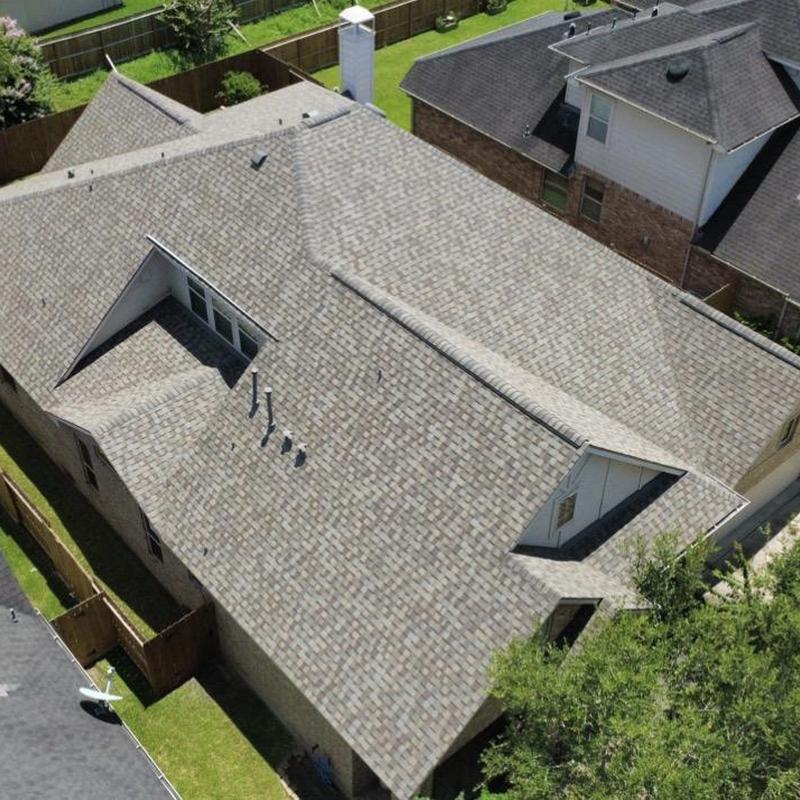 Architectural shingle roof with ridge vents in Pearland TX