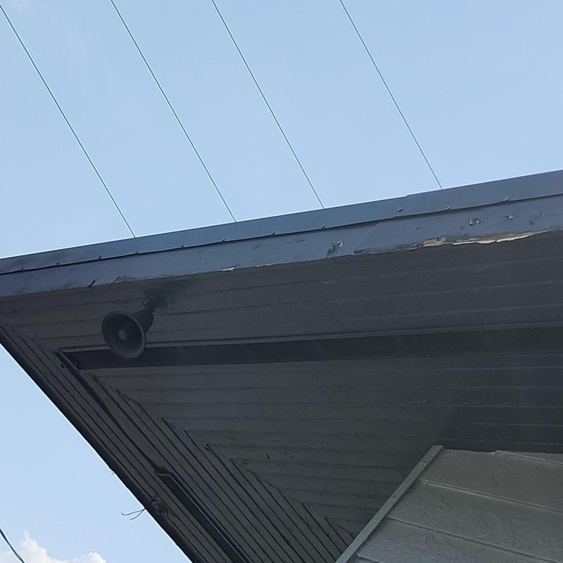 Rake metal flashing and painted roof edge trim Rake metal flashing and painted roof edge trim