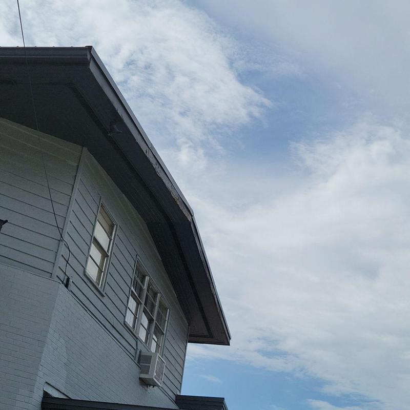 Rake metal installation and painting on roof edge Rake metal installation and painting on roof edge