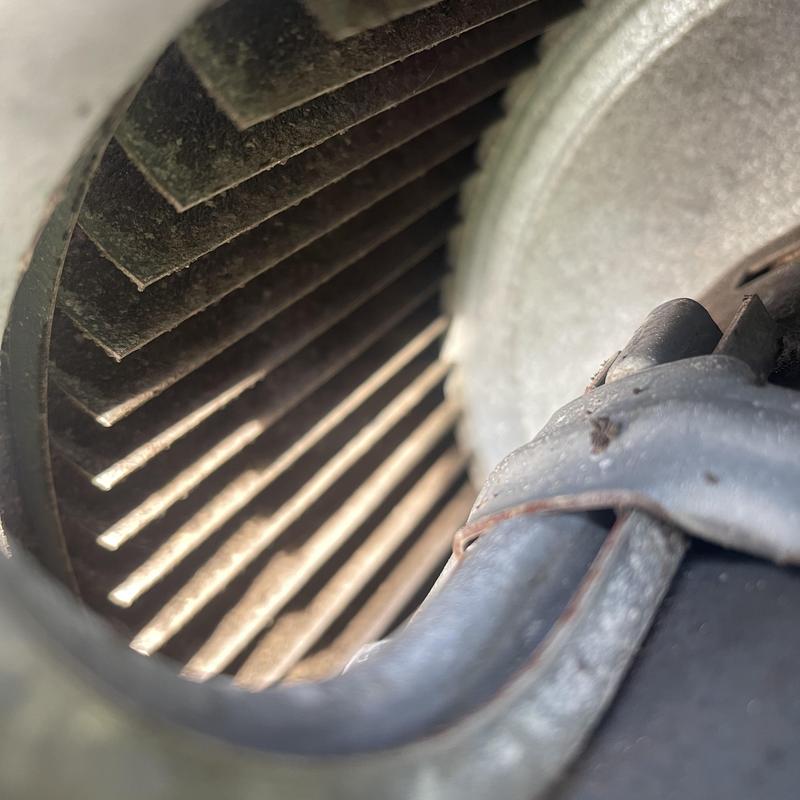Blower wheel inside residential HVAC package unit