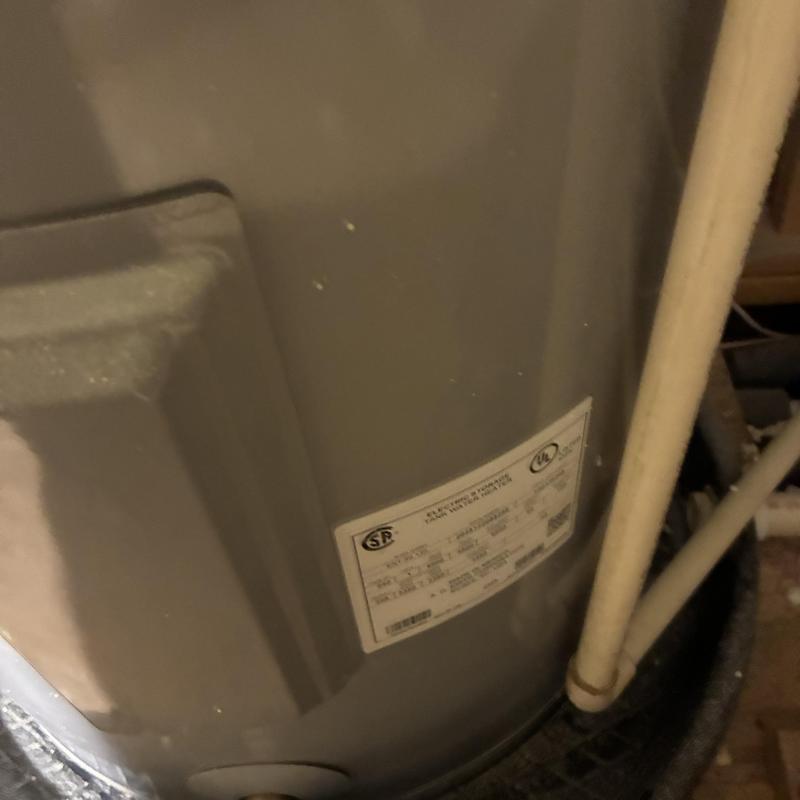 Water heater tank with replacement parts installed