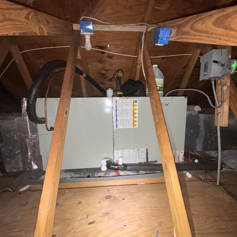 Heat pump split system in attic space