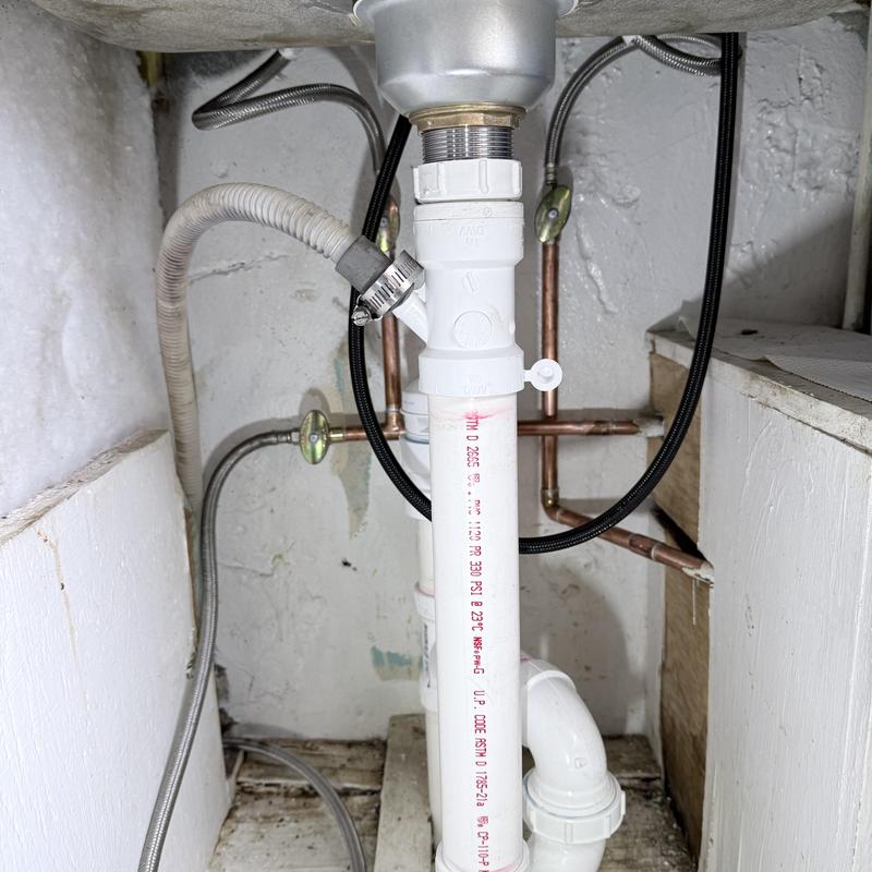 Kitchen sink drain and emergency stop valves installation
