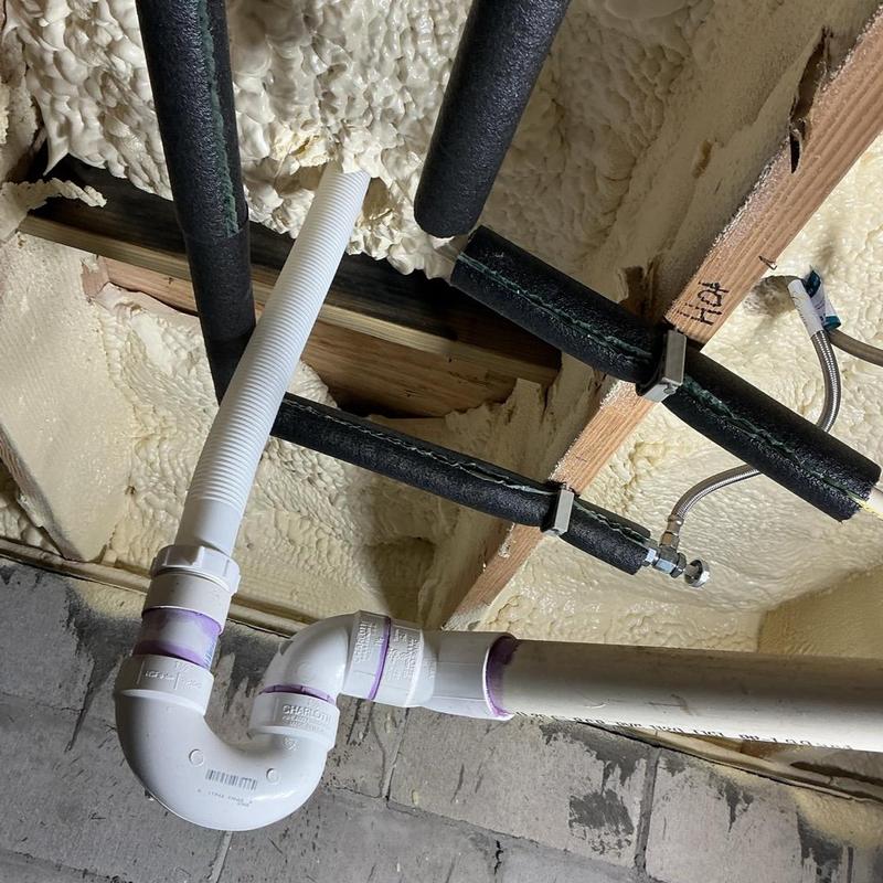 Tubular free-standing tub drain with new P-trap installation Tubular free-standing tub drain with new P-trap installation