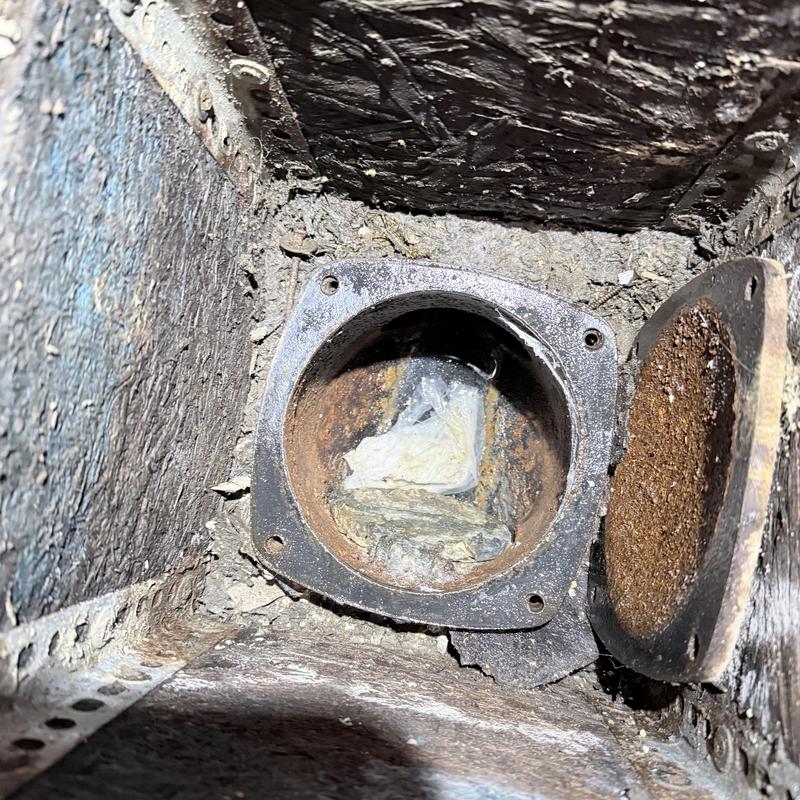 Backwater valve open in basement drain line Backwater valve open in basement drain line
